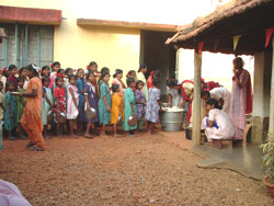 Children queuing up for their meal at Basinda Mission